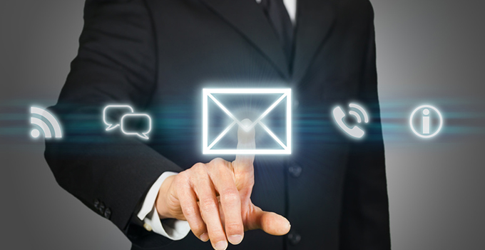 Businessman clicking on email icon